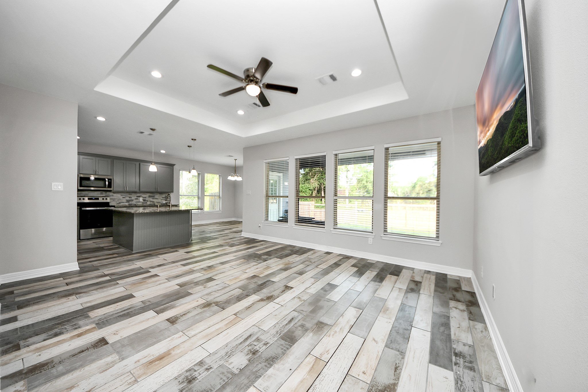 25450 Killarney Road Hempstead, TX 77445 - Photo 5 of 34 a view of an empty room with a kitchen