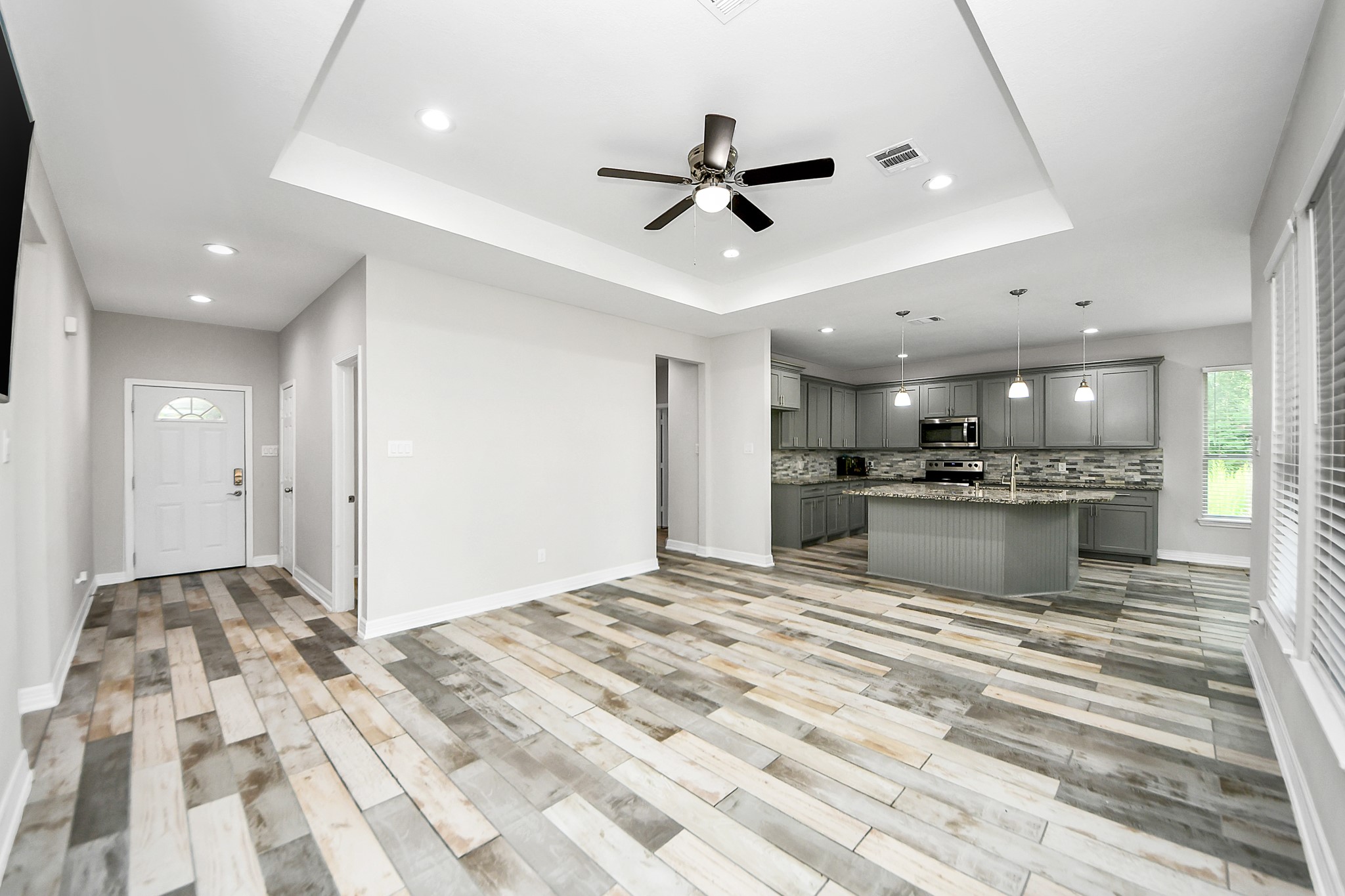 25450 Killarney Road Hempstead, TX 77445 - Photo 6 of 34 a view of a kitchen with a sink and cabinets