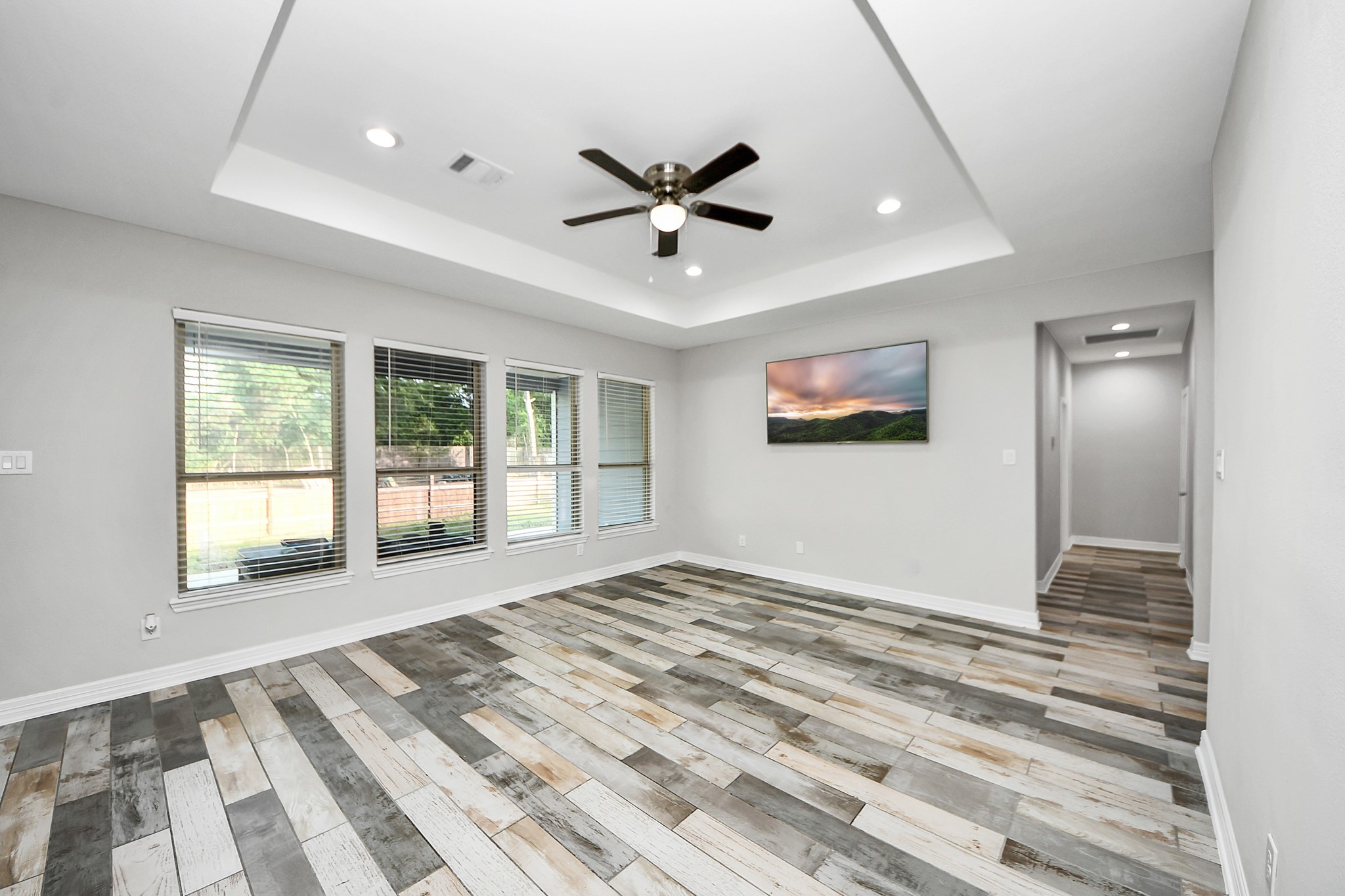 25450 Killarney Road Hempstead, TX 77445 - Photo 8 of 34 a view of a livingroom with a ceiling fan and window