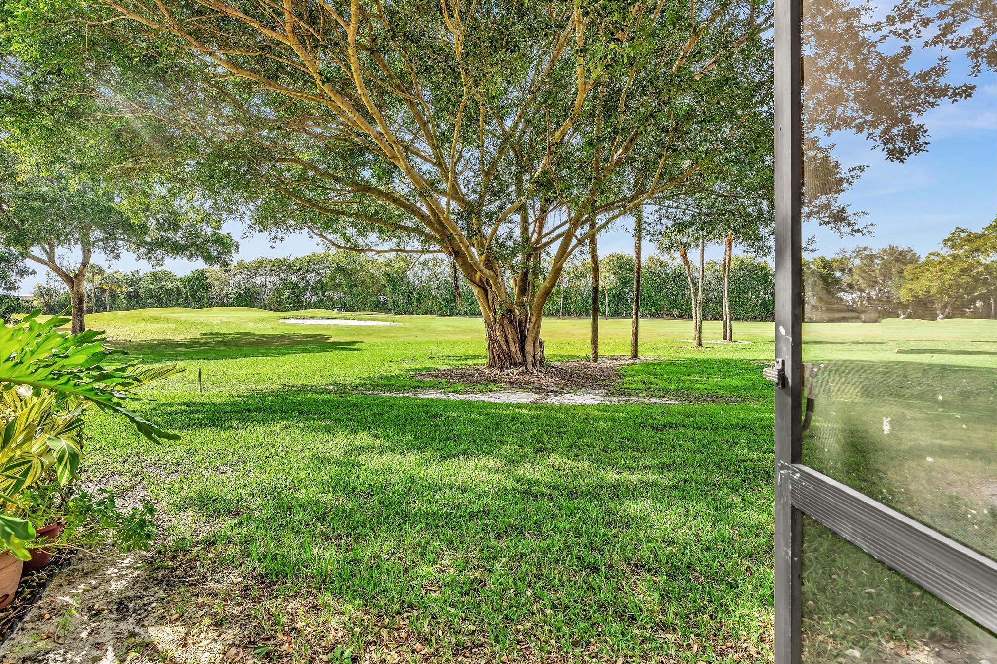 17372 Boca Club Boulevard, Unit 405 Boca Raton, FL 33487 - Photo 20 of 74 a view of outdoor space with deck and yard