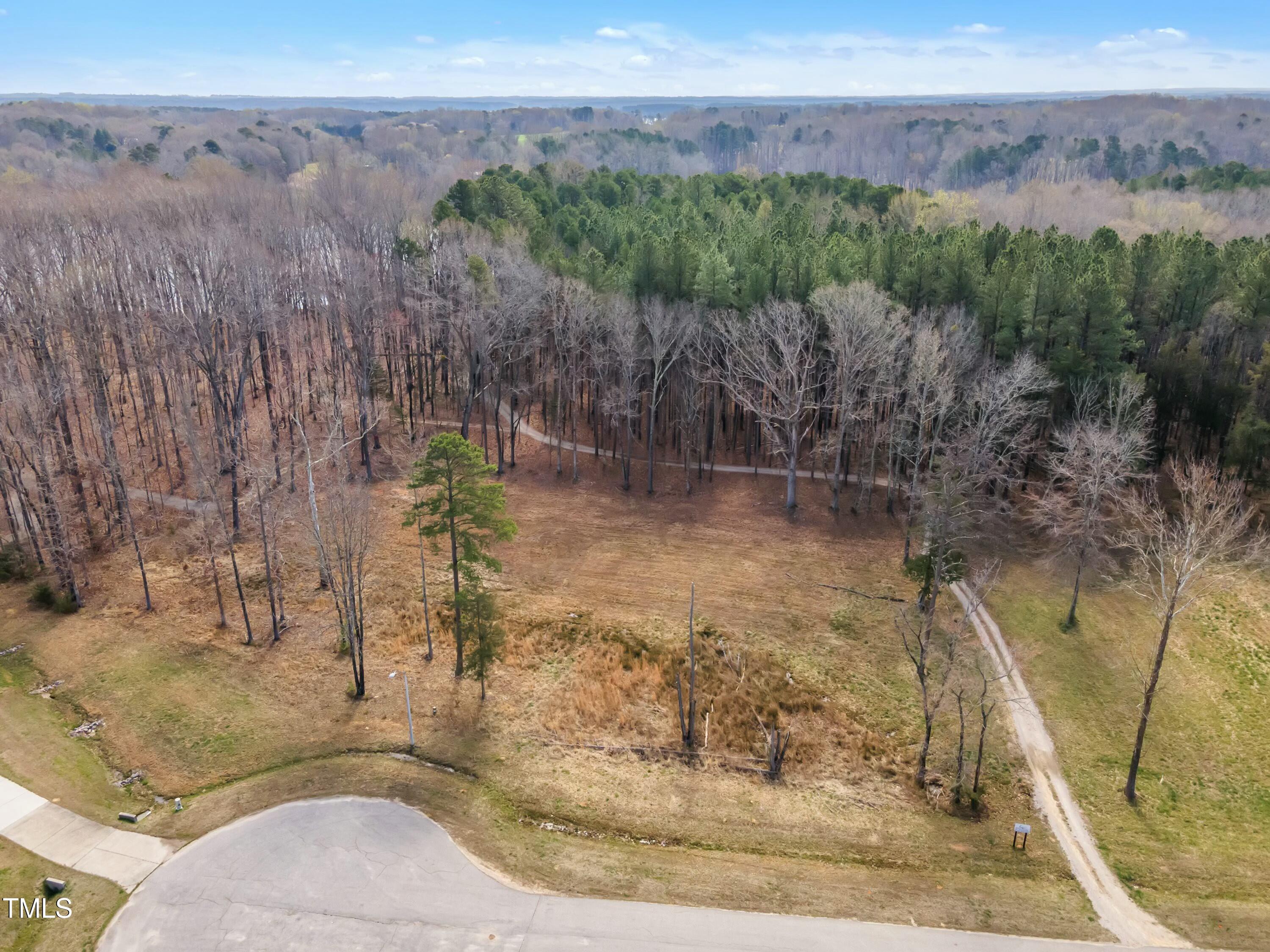 33 Waterstone Lane Henderson, NC 27537 - Photo 2 of 17 a view of a yard