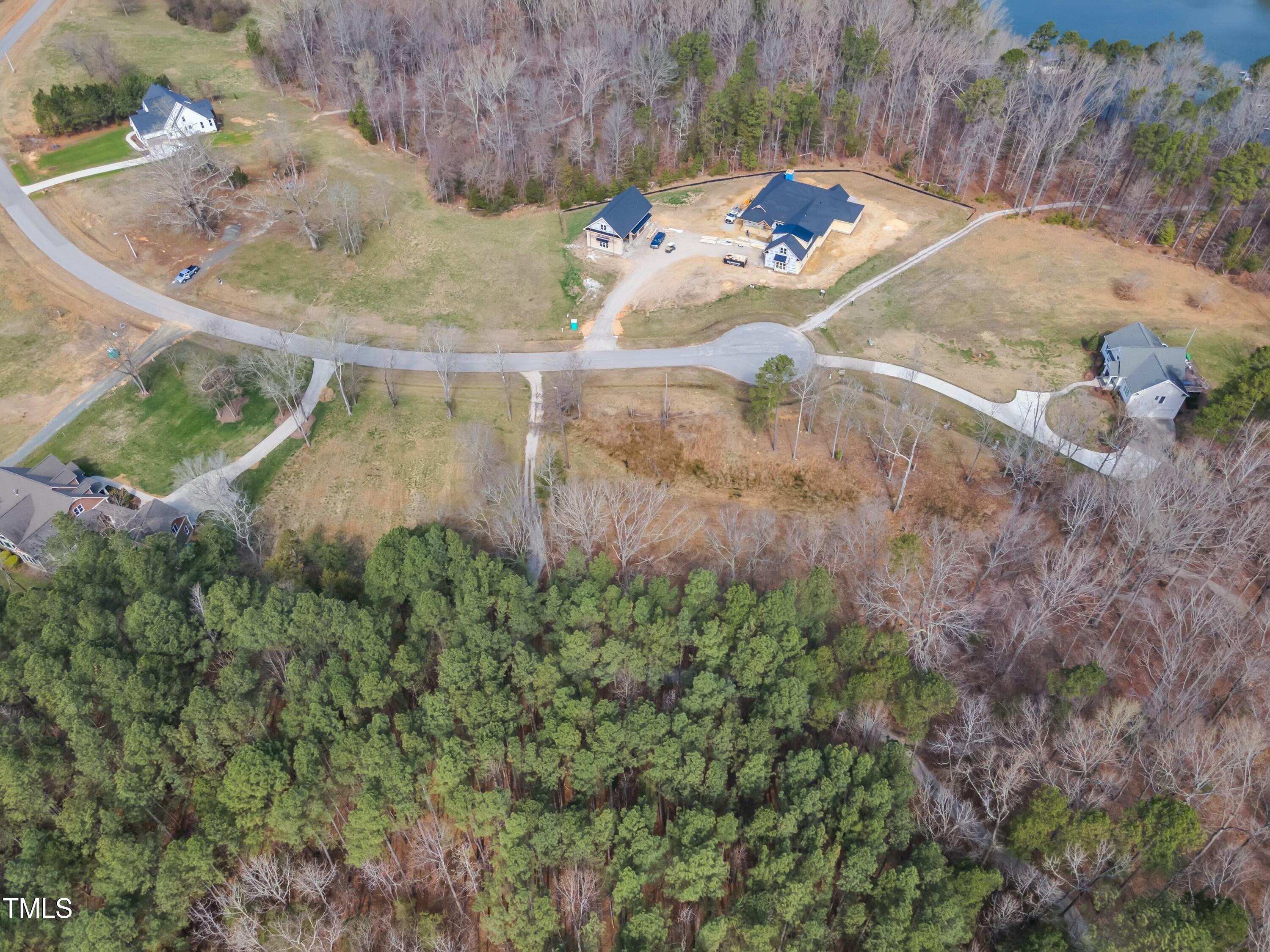 33 Waterstone Lane Henderson, NC 27537 - Photo 7 of 17 a backyard of a house with outdoor seating