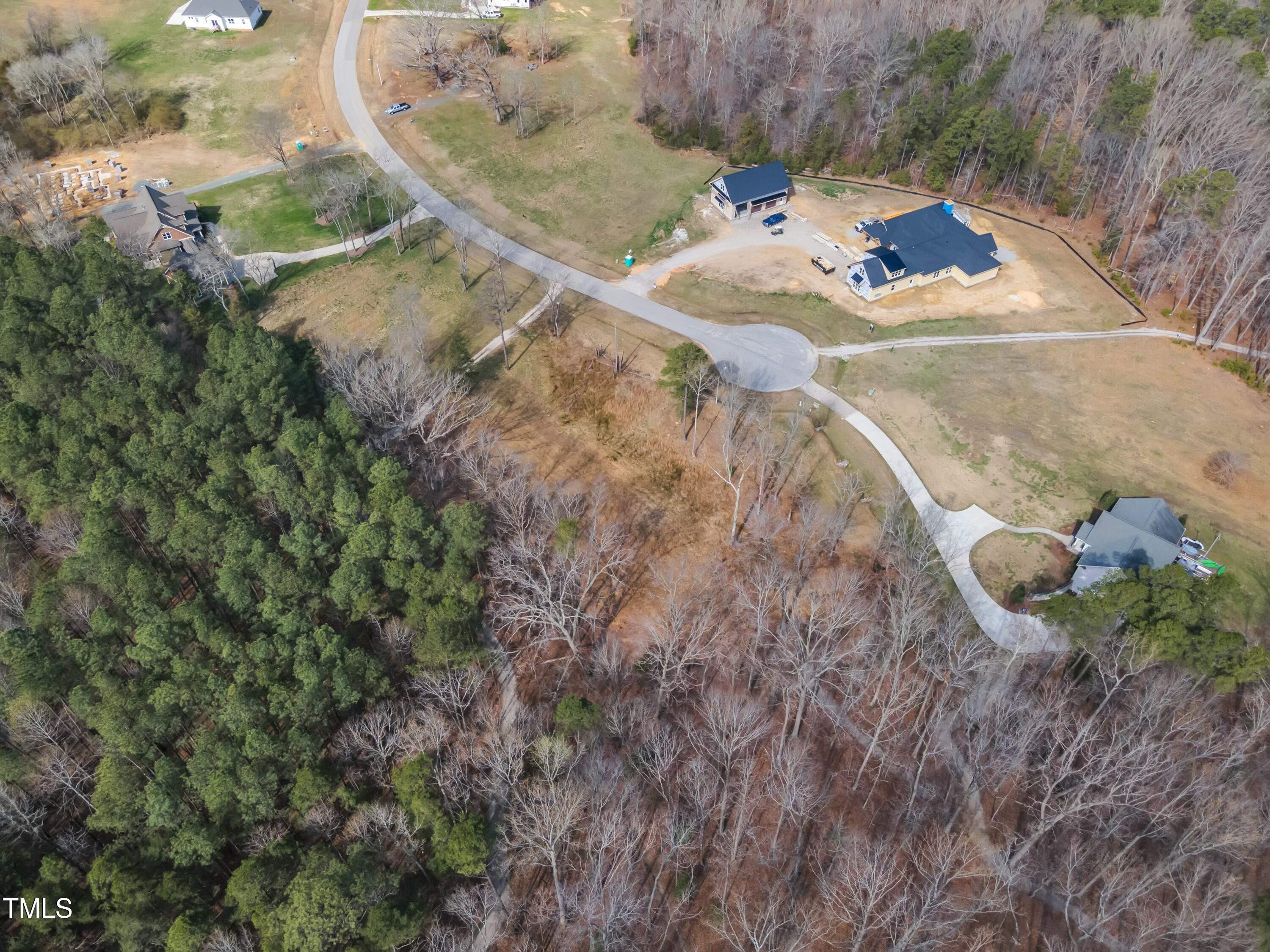 33 Waterstone Lane Henderson, NC 27537 - Photo 10 of 17 a view of a backyard of a house
