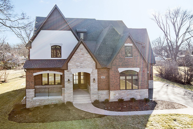 1851 Beechnut Road Northbrook, IL 60062 - Photo 1 of 40 a front view of a house with entertaining space