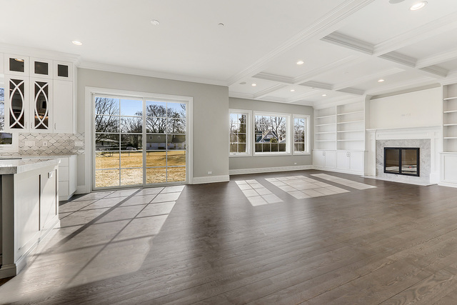 1851 Beechnut Road Northbrook, IL 60062 - Photo 13 of 40 an empty room with windows and fireplace