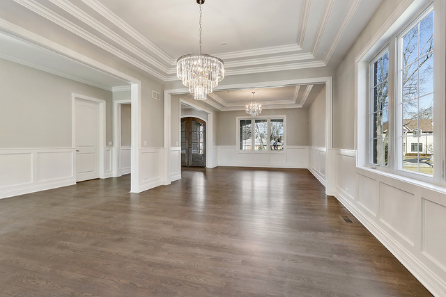 1851 Beechnut Road Northbrook, IL 60062 - Photo 16 of 40 a view of an empty room with wooden floor and a window