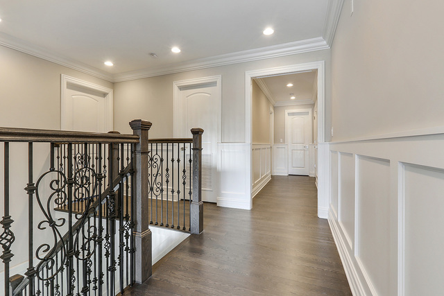1851 Beechnut Road Northbrook, IL 60062 - Photo 18 of 40 a view of a hallway with wooden floor