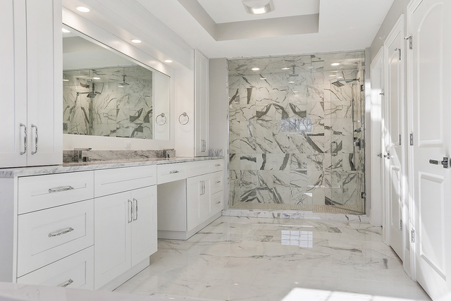 1851 Beechnut Road Northbrook, IL 60062 - Photo 21 of 40 a bathroom with a granite countertop sink mirror and bathtub