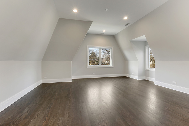 1851 Beechnut Road Northbrook, IL 60062 - Photo 23 of 40 an empty room with wooden floor and windows