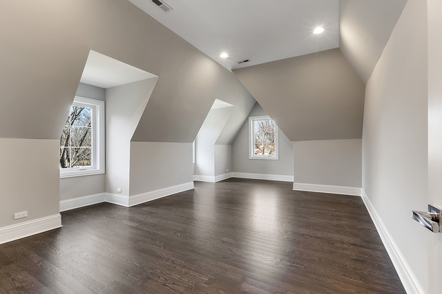1851 Beechnut Road Northbrook, IL 60062 - Photo 27 of 40 an empty room with wooden floor and windows