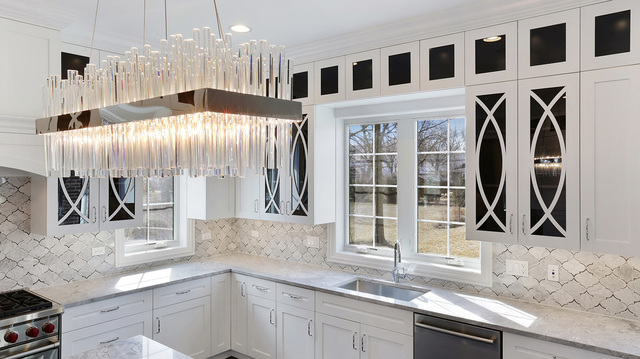 1851 Beechnut Road Northbrook, IL 60062 - Photo 7 of 40 a view of a kitchen with a sink and a large window