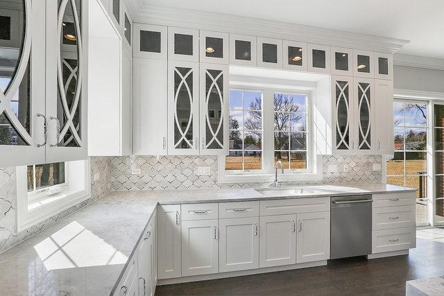 1851 Beechnut Road Northbrook, IL 60062 - Photo 9 of 40 a kitchen with stainless steel appliances granite countertop a sink and a granite counter tops