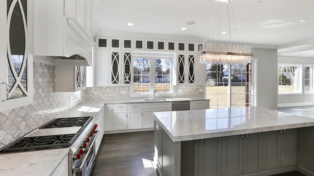 1851 Beechnut Road Northbrook, IL 60062 - Photo 10 of 40 a kitchen with stainless steel appliances granite countertop a stove and a sink