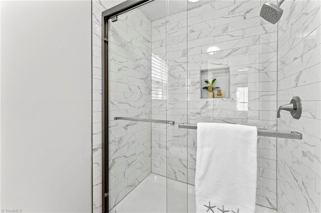 5401 Tower Road Greensboro, NC 27410 - Photo 12 of 21 Tile surround shower