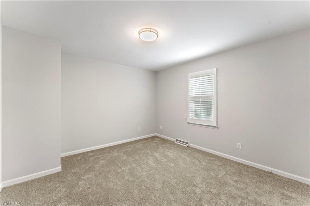 5401 Tower Road Greensboro, NC 27410 - Photo 14 of 21 3rd bedroom upstairs
