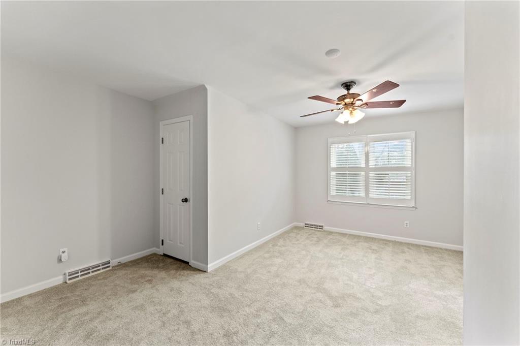 5401 Tower Road Greensboro, NC 27410 - Photo 15 of 21 4th bedroom upstairs