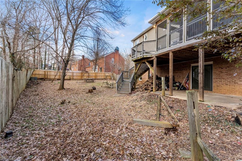 5401 Tower Road Greensboro, NC 27410 - Photo 20 of 21 Flat, fenced backyard