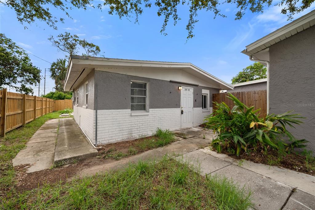 605 South Disston Avenue Tarpon Springs, FL 34689 - Photo 27 of 47 a view of a house with a yard