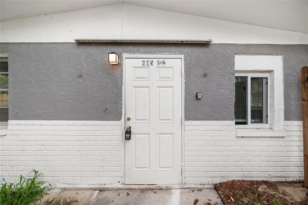 605 South Disston Avenue Tarpon Springs, FL 34689 - Photo 28 of 47 a front view of a house with white wall