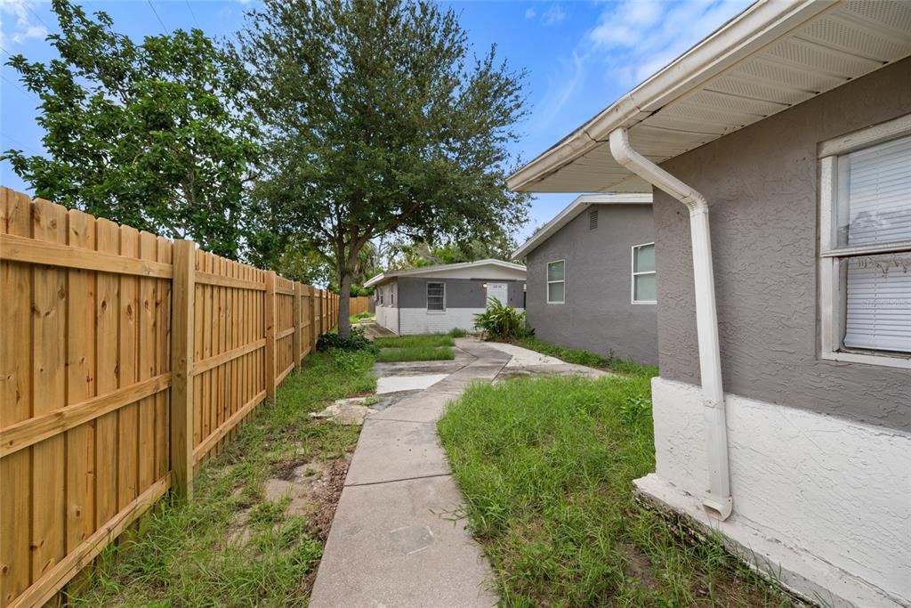 605 South Disston Avenue Tarpon Springs, FL 34689 - Photo 39 of 47 a house view with a backyard space