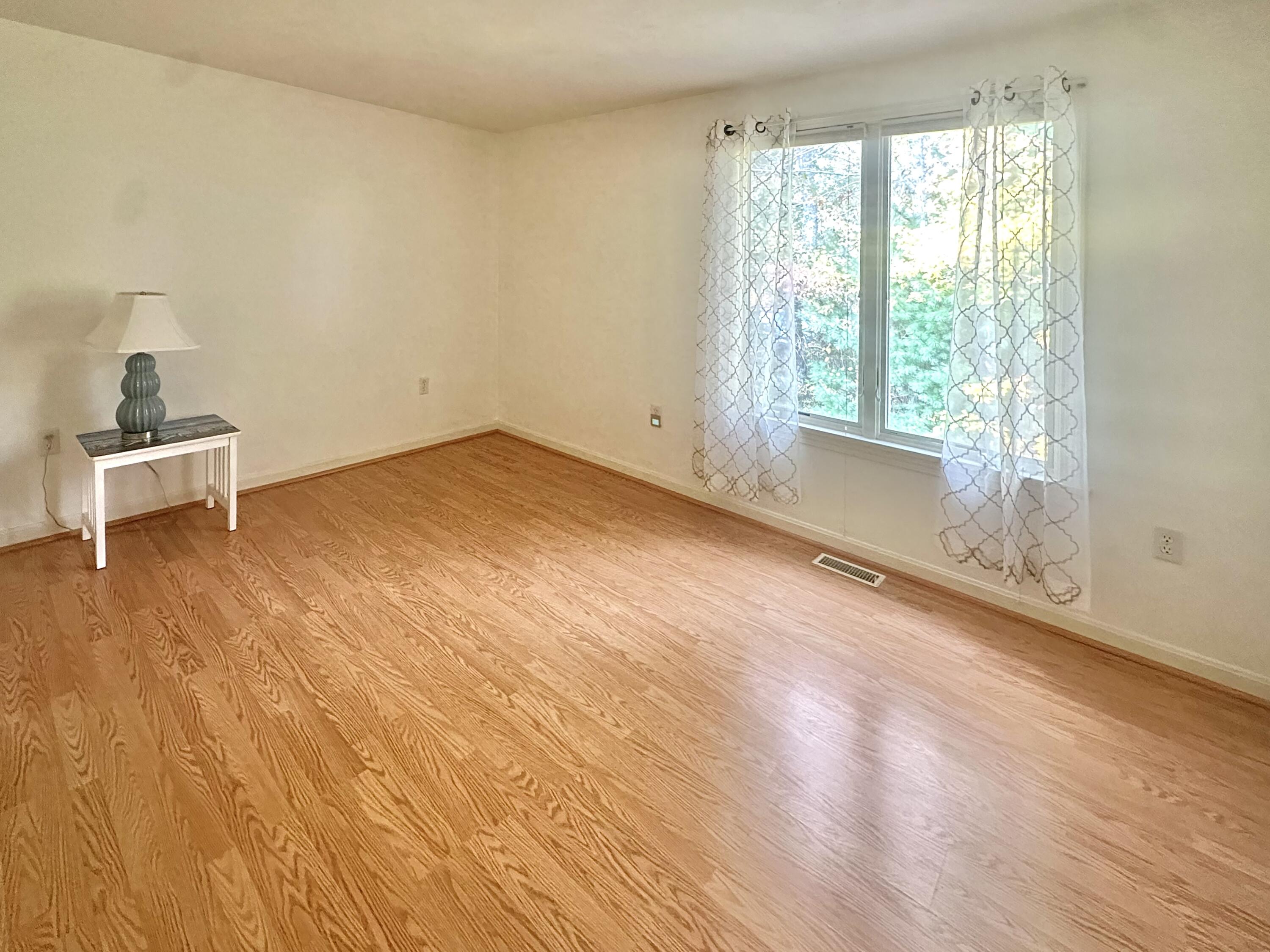 4 North Ridge Road Mashpee, MA 02649 - Photo 15 of 26 a big room with wooden floor and windows