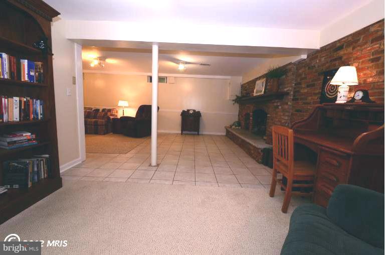 41 Sheridan Road Arnold, MD 21012 - Photo 28 of 30 Basement-Sitting Area towards Fireplace