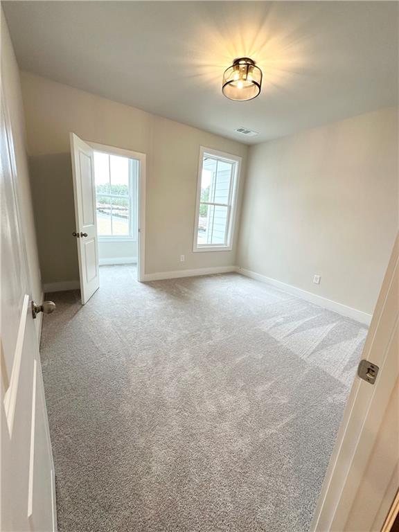 1237 Waldon Crossing Cumming, GA 30041 - Photo 18 of 29 a view of a room with a window