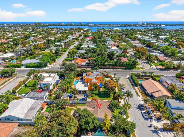 an aerial view of residential houses with outdoor space