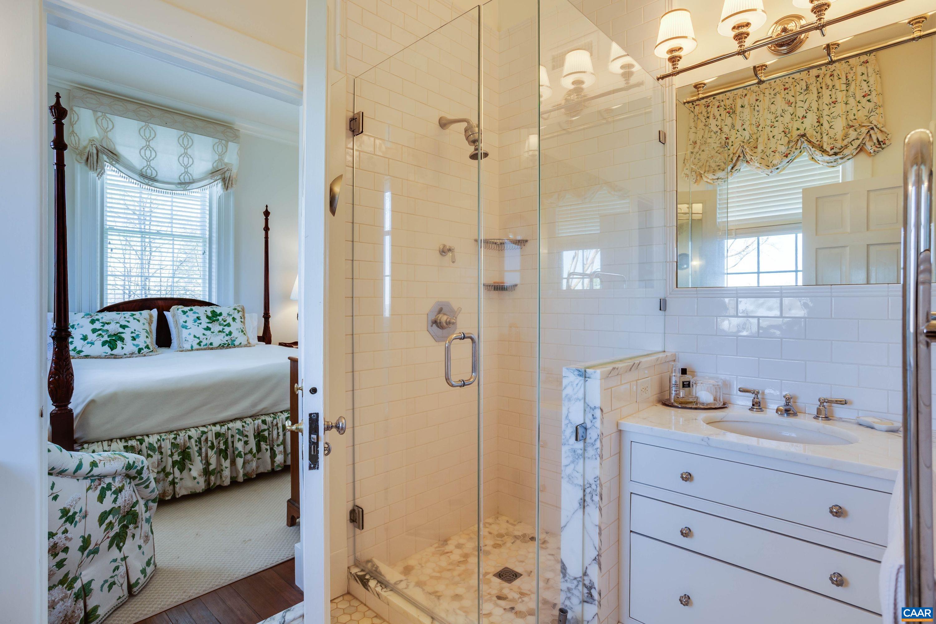 1790 Lambs Road Charlottesville, VA 22901 - Photo 15 of 53 a bedroom with a bed and a mirror