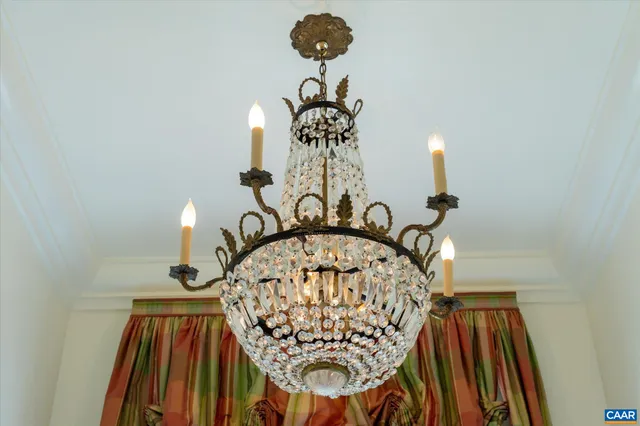 a view of a chandelier with a table