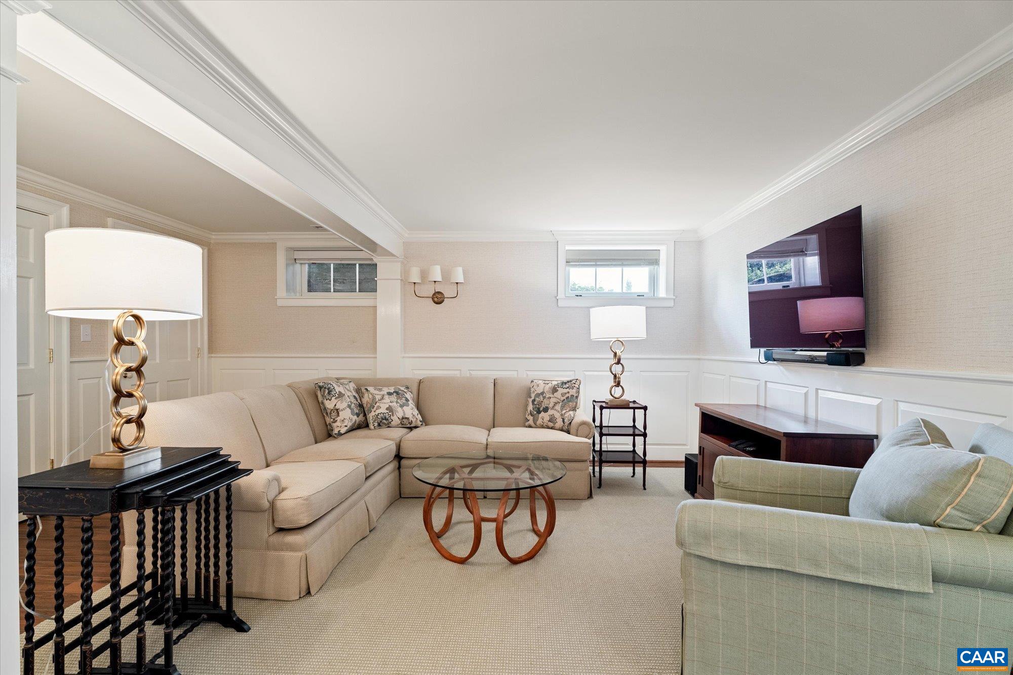 1790 Lambs Road Charlottesville, VA 22901 - Photo 22 of 53 a living room with furniture and a flat screen tv