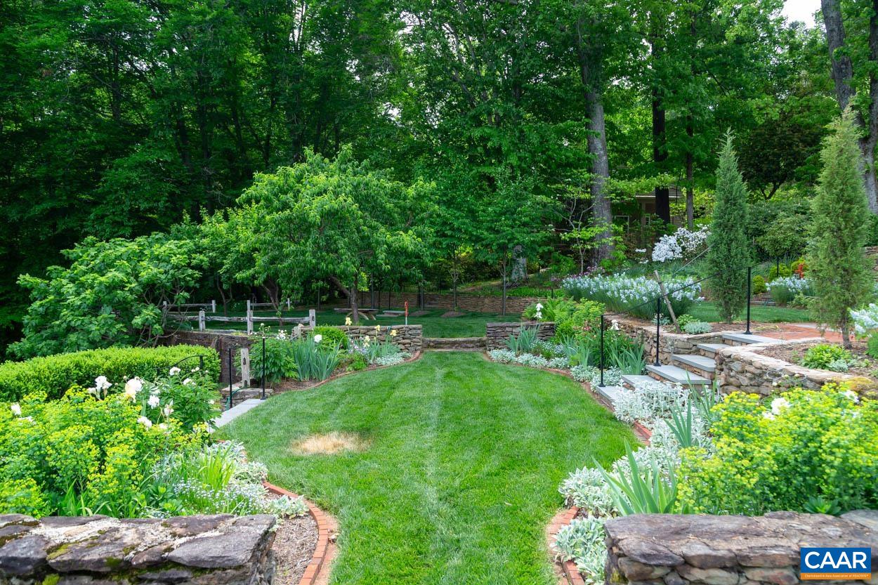 1790 Lambs Road Charlottesville, VA 22901 - Photo 38 of 53 a backyard of a house with lots of green space