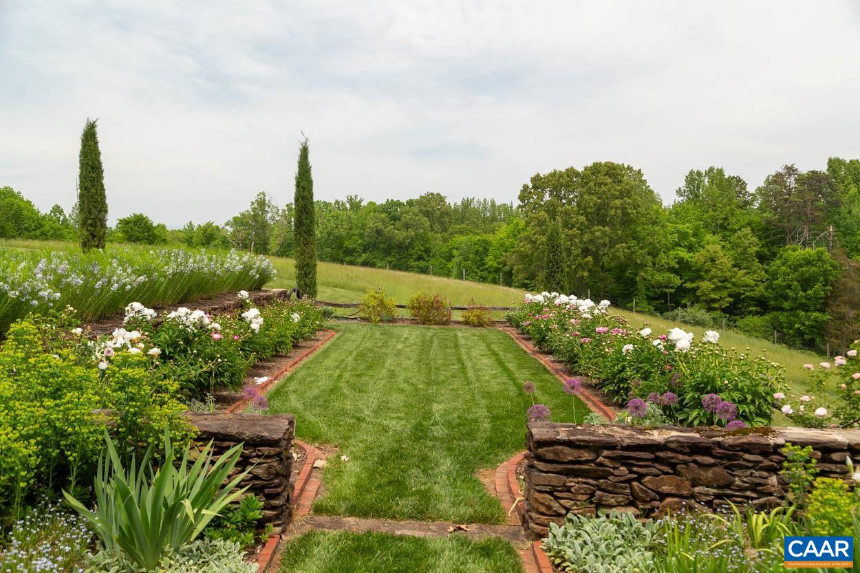 1790 Lambs Road Charlottesville, VA 22901 - Photo 40 of 53 a view of a garden with a fountain