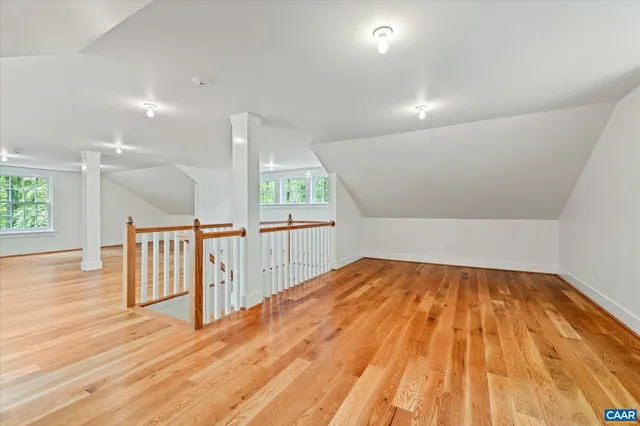 a view of a house with backyard sitting area and garden