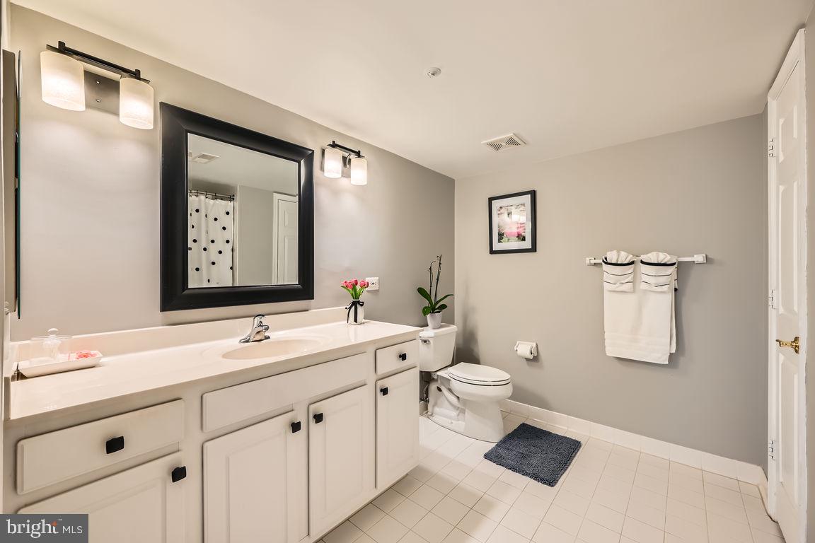 12320 Rosslare Ridge Road, Unit 304 Lutherville-Timonium, MD 21093 - Photo 31 of 48 Updated guest bath: new mirror, light & hardware