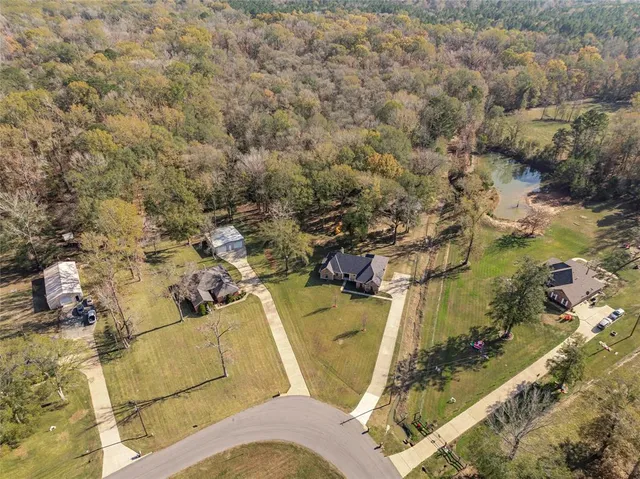 view of a house with a yard