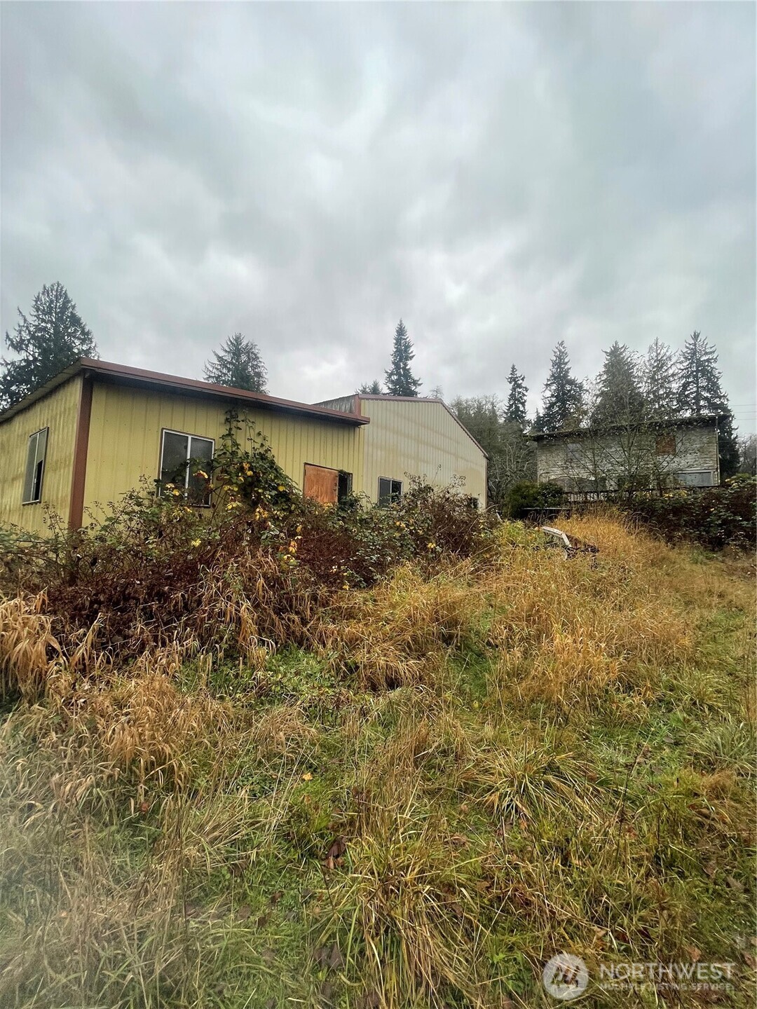1632 Henkle Street Raymond, WA 98577 - Photo 11 of 12 a view of a lake with houses in the back
