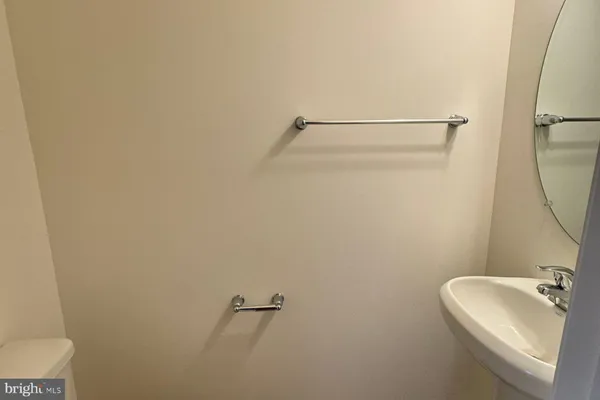 a bathroom with a sink and toilet