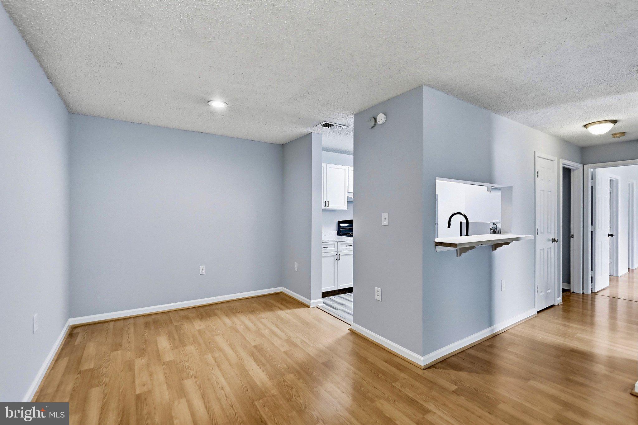 20991 Timber Ridge Terrace, Unit 203 Ashburn, VA 20147 - Photo 10 of 20 Dining Area Off Of Kitchen