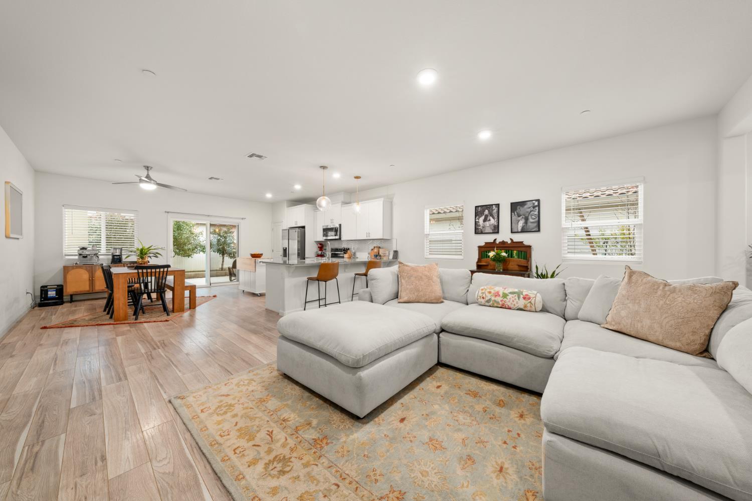 7457 Sobon Lane Rancho Murieta, CA 95683 - Photo 12 of 32 a living room with furniture and kitchen view