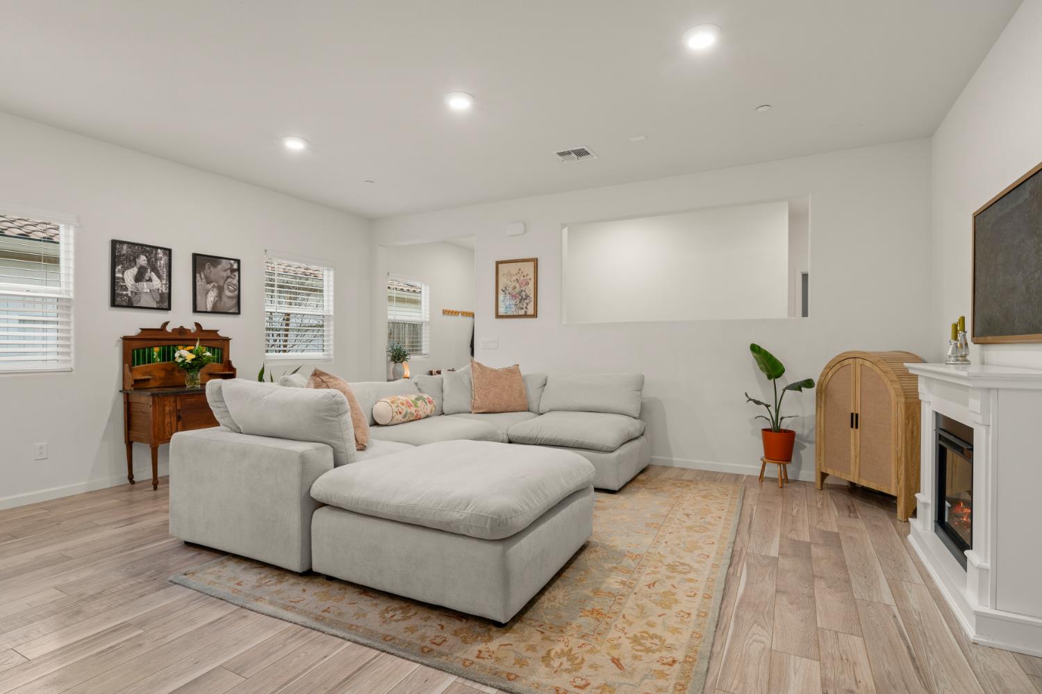 7457 Sobon Lane Rancho Murieta, CA 95683 - Photo 13 of 32 a living room with furniture and a flat screen tv