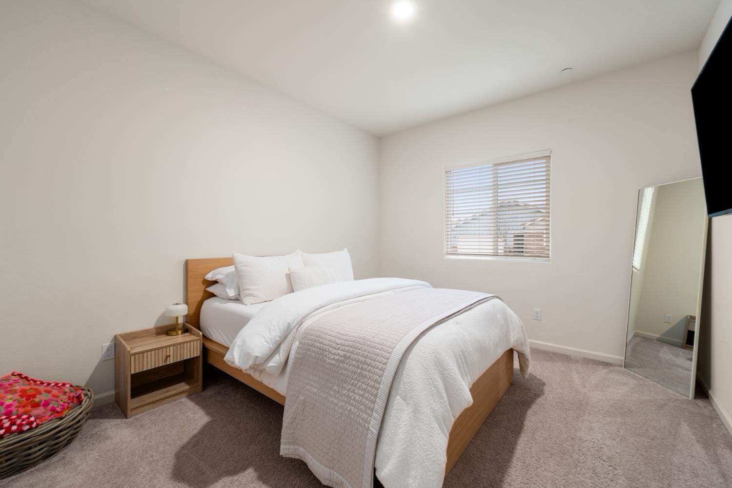 7457 Sobon Lane Rancho Murieta, CA 95683 - Photo 16 of 32 a bedroom with a bed and a tv
