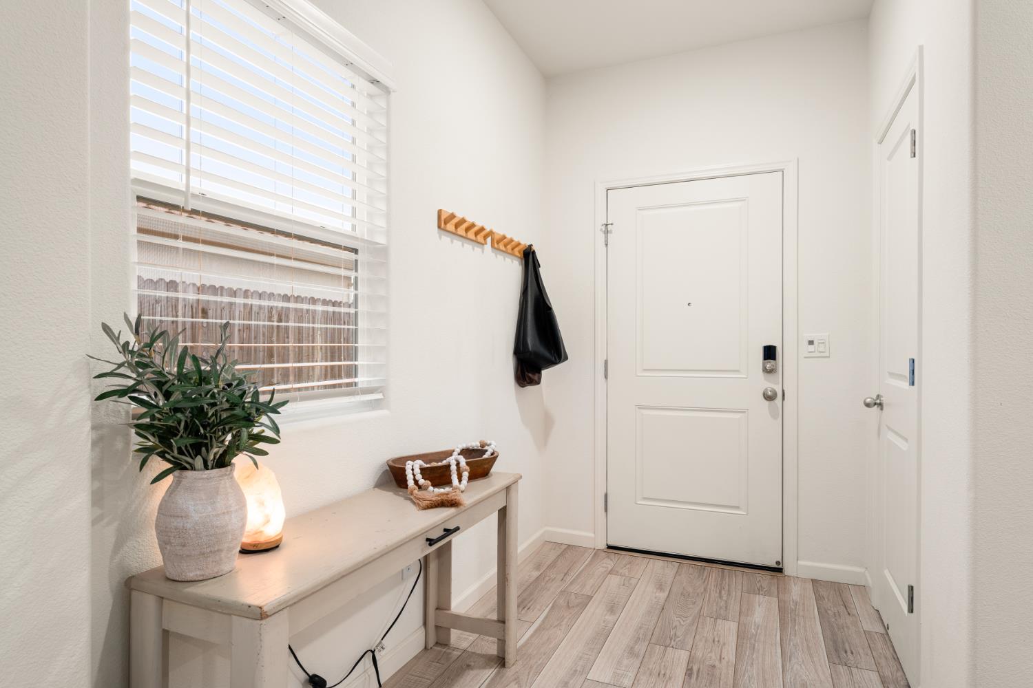 7457 Sobon Lane Rancho Murieta, CA 95683 - Photo 21 of 32 a view of entryway with wooden floor