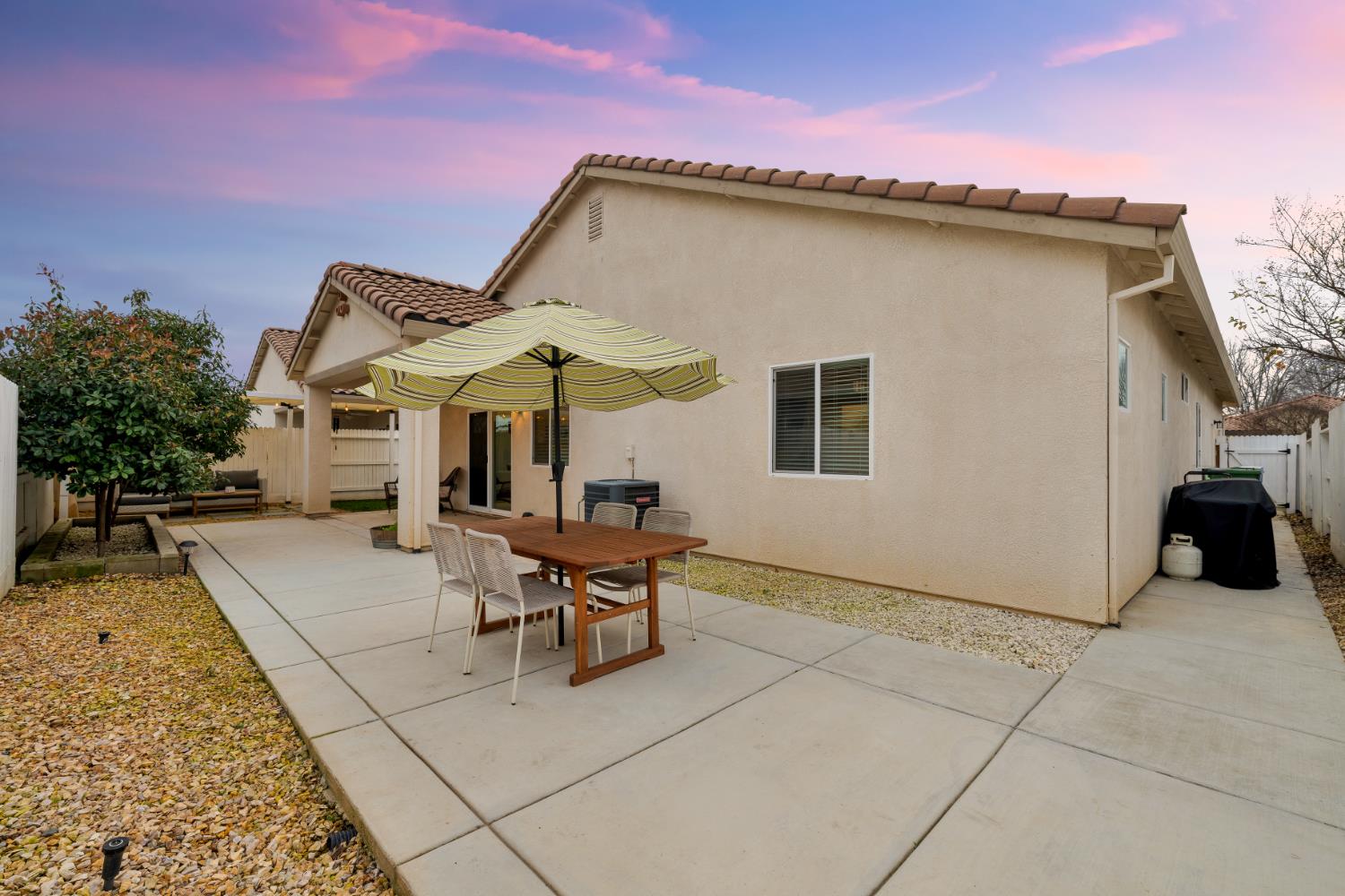 7457 Sobon Lane Rancho Murieta, CA 95683 - Photo 27 of 32 a view of a house with patio porch and sitting area