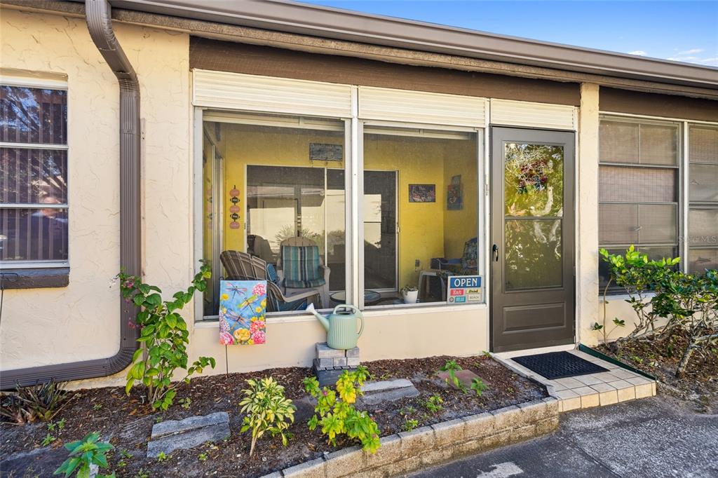 2101 Sunset Point Road, Unit 1102 Clearwater, FL 33765 - Photo 22 of 27 Screened-in patio