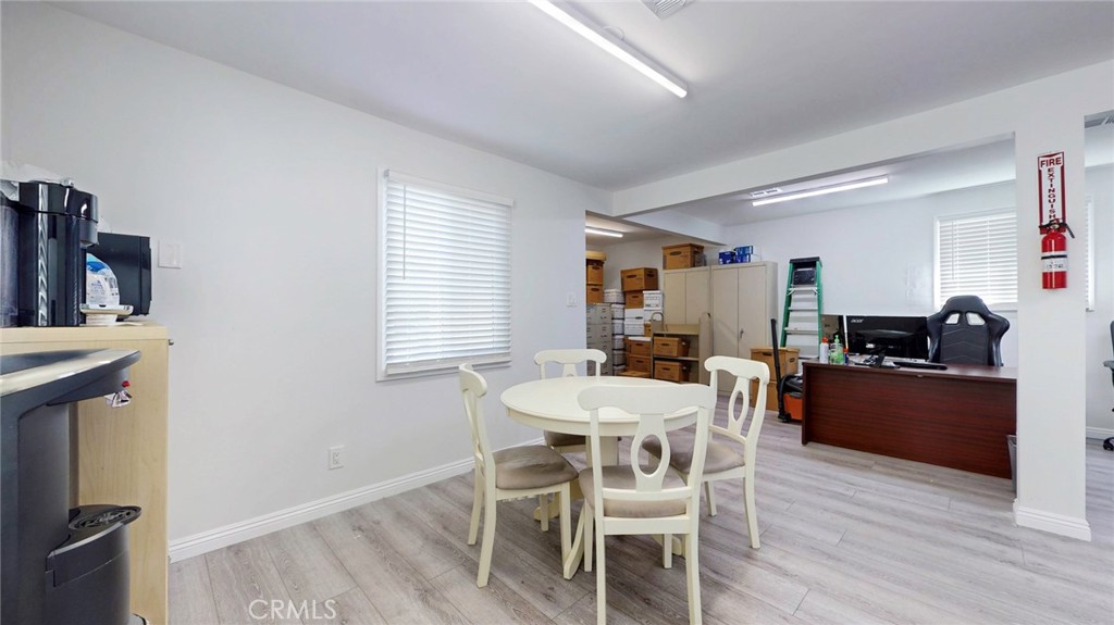 6851 Foothill Boulevard Tujunga, CA 91042 - Photo 25 of 50 a view of a dining room with furniture and wooden floor