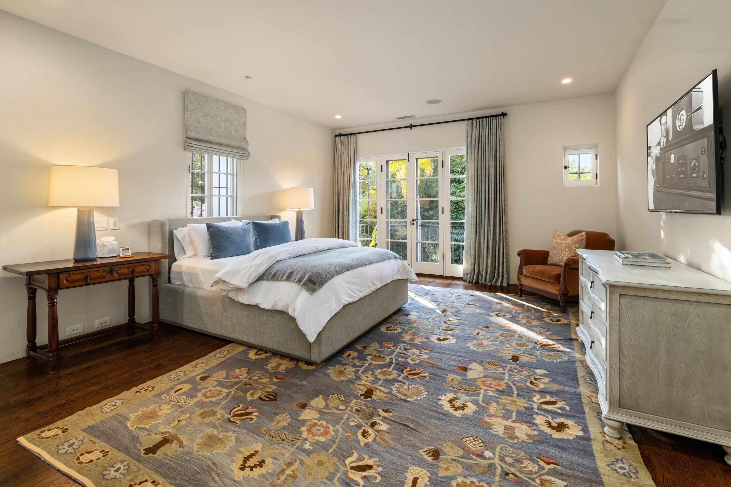 1284 Mesa Road Montecito, CA 93108 - Photo 16 of 26 a bed room with a bed and a couch