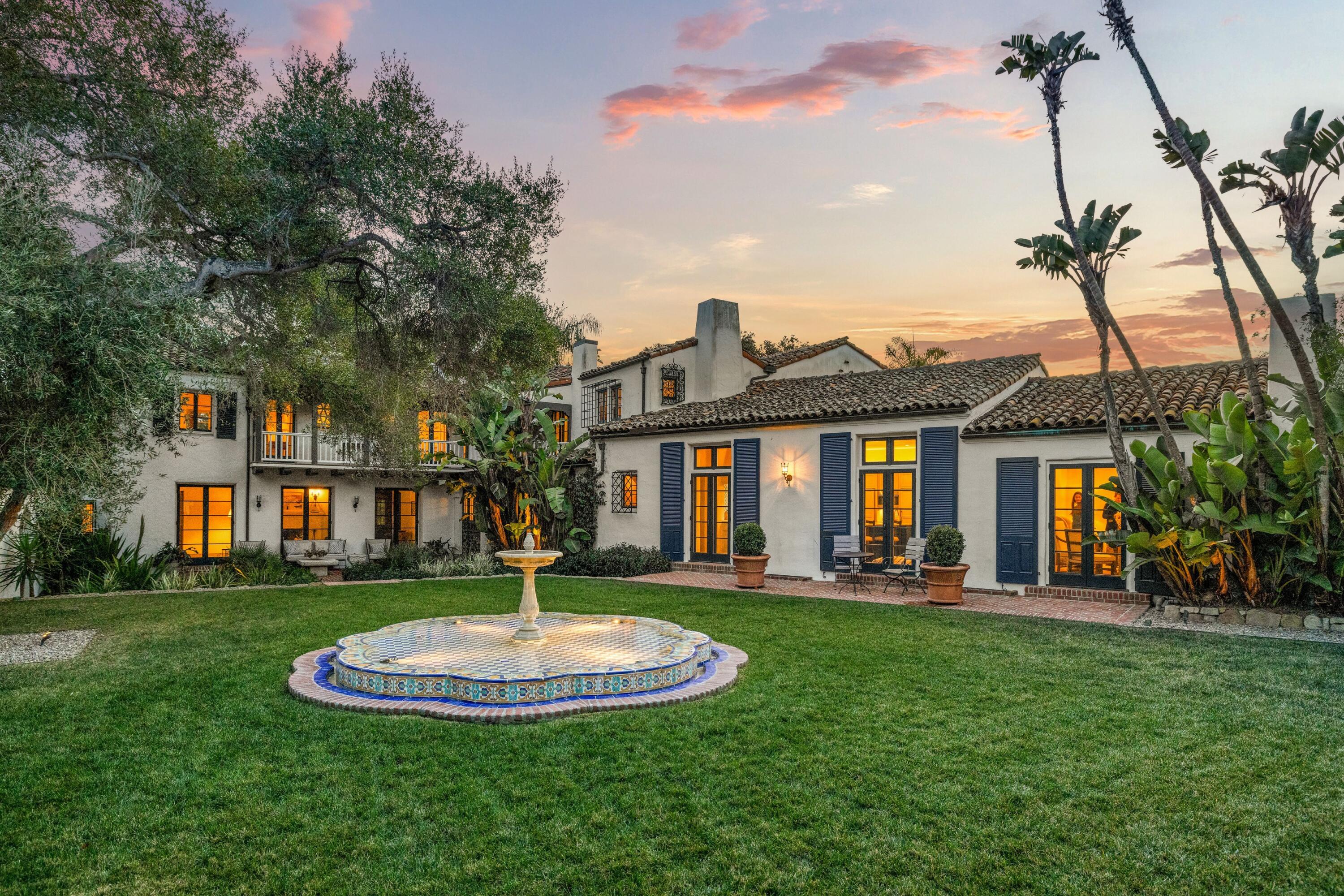 1284 Mesa Road Montecito, CA 93108 - Photo 20 of 26 a front view of a house with a yard and trees