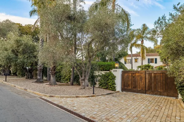 a house with trees in front of it