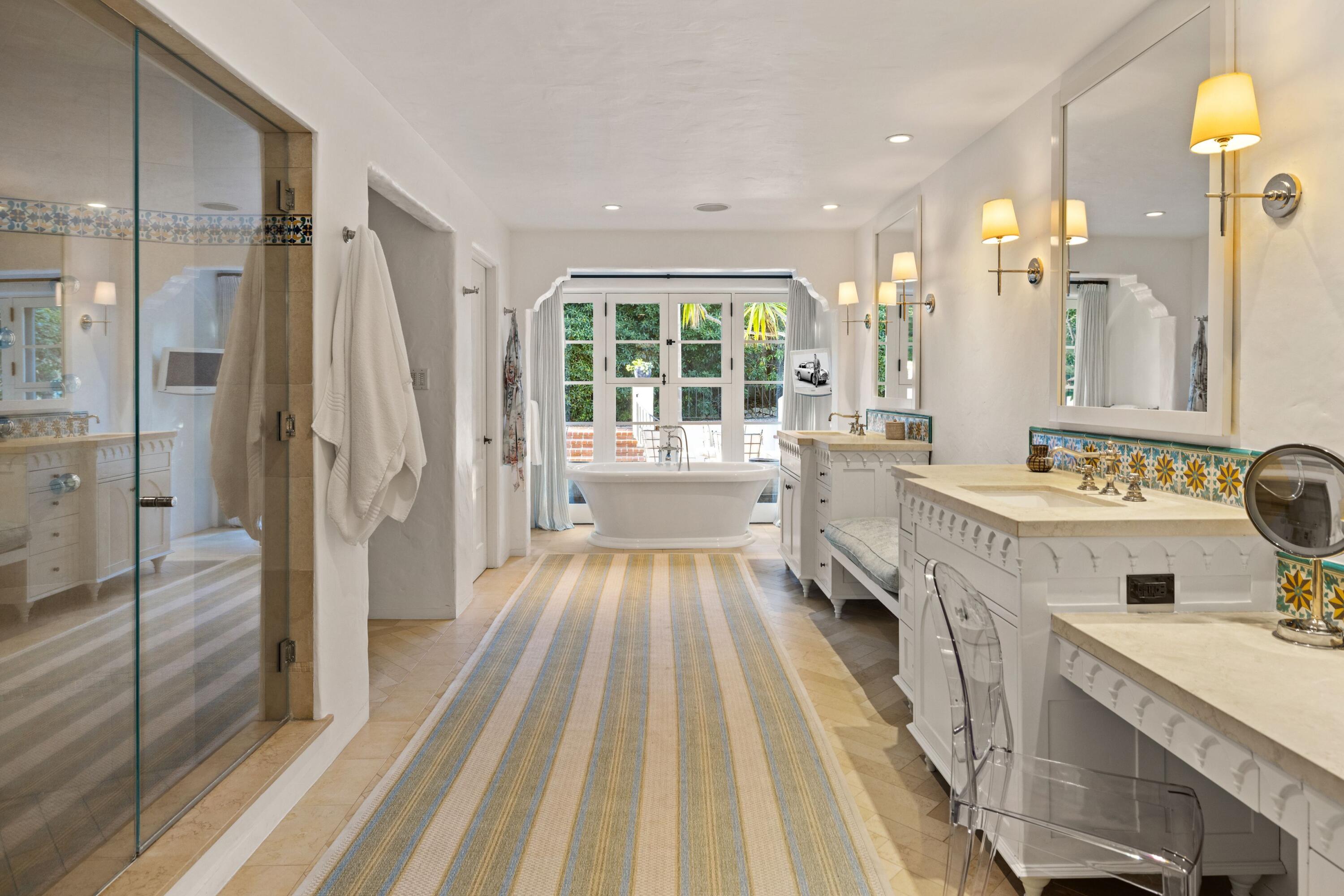 1284 Mesa Road Montecito, CA 93108 - Photo 7 of 26 a bathroom with a sink a mirror and a shower